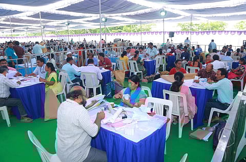 Polling staff at a material distribution centre at Don Bosco Junior College in Nalgona, Telangana. (Photo | EPS)