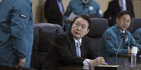 South Korean President Yoon Suk-yeol (C) at a meeting of the National Security Council over North Korea's missile launch, November 22, 2022.(Photo | AP)