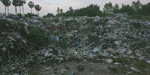 Garbage is dumped in Neduvasal dumpyard in Perambalur. (Photo |EPS)