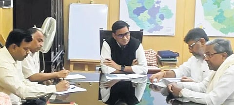 Congress leaders meet Chief Electoral Officer Manoj Kumar Meena to seek a judicial probe into allegations of  tampering with voter data, in Bengaluru on Saturday