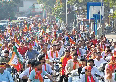BJP supporters take out an election campaign rally from Ghatlodiya, the constituency of Gujarat Chief Minister Bhupendra Patel in Ahmedabad | pti