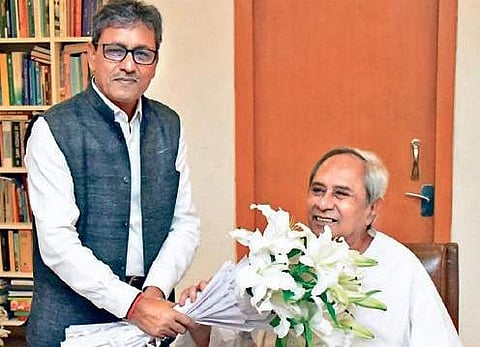 DG STPI Omkar Rai greeting CM Naveen Patnaik