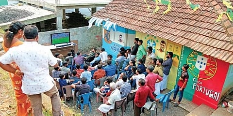 People watching World Cup football match between Argentina and Saudi Arabia on the premises of the house at Mundakkamugal in Kochi on Tuesday. (Photo | T P Sooraj)