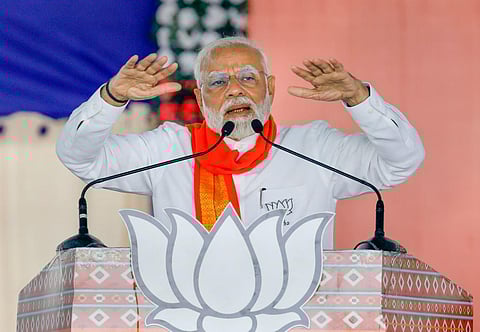 Prime Minister and senior BJP leader Narendra Modi addresses a public meeting ahead of the upcoming Gujarat Assembly elections, in Mehsana. (Photo | PTI)