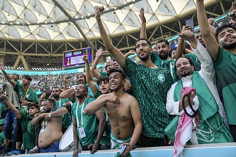 Saudi Arabia's fans celebrate their victory after the World Cup group C soccer match between Argentina and Saudi Arabia at the Lusail Stadium in Lusail, Qatar, Nov. 22, 2022. (Photo | AP)
