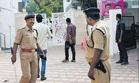 Police personnel stand guard as I-T teams conduct searches at one of the premises of Malla Reddy and his associates in Hyderabad on Tuesday | Vinay Madapu