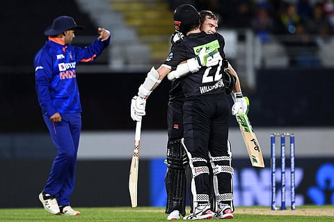 New Zealand's Tom Latham celebrates his century with batting partner Kane Williamson during the first ODI match against India in Auckland, Nov. 25, 2022. (Photo | AP)
