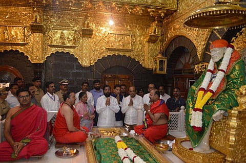 Shinde on Wednesday reportedly cancelled his official meetings and rushed to Shirdi to seek the blessing of Saibaba. (Photo | ANI)