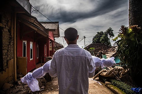 A 5.6 magnitude earthquake on 21 November left at least 272 (as of today) dead, more than a third of them children, on Indonesia's main island of Java, as buildings crumbled and terrified residents ran for their lives. IN PIC: A father carris his dead son