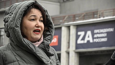 'Vladimir Vladimirovich, answer our questions!' (Photo | AFP)