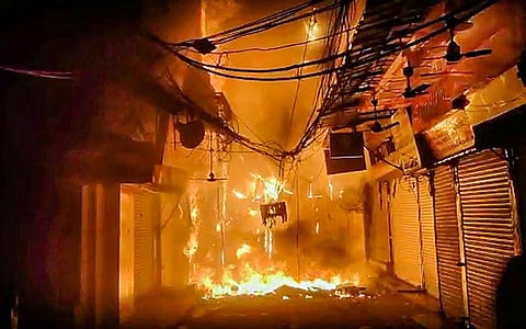 Fire at Bhagirath Palace Market in Delhi, on November 24, 2022. (Photo | PTI)