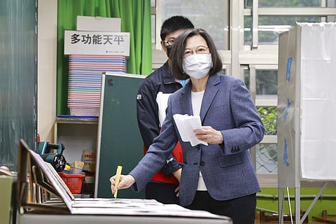 Taiwan President Tsai Ing-wen casts her ballots at a polling station in New Taipei City, Taiwan on Nov. 26, 2022 (Photo |AP)