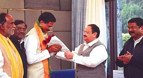 BJP national president JP Nadda greets Shashidhar Reddy soon after the latter joined the party in New Delhi on Friday