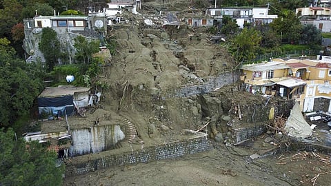 An aerial view of damaged houses after heavy rainfall triggered landslides that collapsed buildings and left as many as 12 people missing on the southern Italian island of Ischia. (Photo | AP)