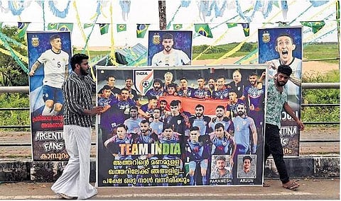 Fans walking with a poster of Indian national team in Kozhikode. (Photo | E Gokul, EPS)