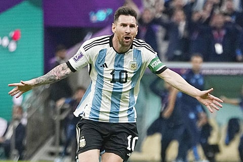 Argentina's Lionel Messi celebrates after scoring his side's opening goal during the World Cup group C soccer match between Argentina and Mexico. (Photo | AP)