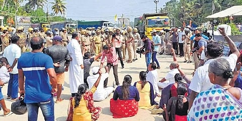 Protesters of the Vizhinjam agitation committee block trucks reaching the port site at Mulloor on Saturday | EXpress