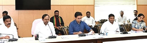 Chief Minister K Chandrasekhar Rao chairs the review meeting on Sunday. Minister KT Rama Rao and MLC K Kavitha are also seen.