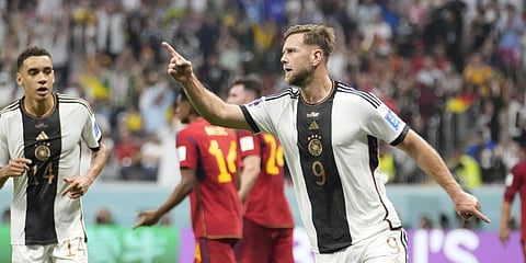 Germany's Niclas Fuellkrug celebrates after he scored his side's first goal during the World Cup group E soccer match between Spain and Germany, at the Al Bayt Stadium in Al Khor .(Photo | AP)
