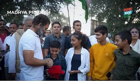 Boy offers piggy bank to Rahul Gandhi. (Photo | Rahul Gandhi Twitter)