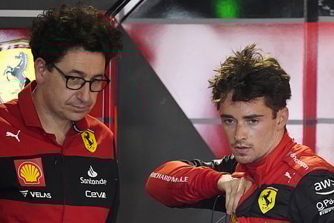Ferrari driver Charles Leclerc(R) of Monaco speaks with Ferrari team principal Mattia Binotto(L) (File Photo | AP)