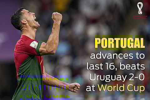 Portugal advanced to the last 16 by winning over Uruguay 2-0 at FIFA World Cup 2022. Cristiano Ronaldo wheeled away in celebration, acting as though he had scored once again at the World Cup. (Photo | AP)