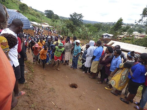 Image used for representational purpose only.  Rescue workers carry a body from the rubble of a landslide in Bafoussam Cameroon, Tuesday, Oct. 29, 2019. (File Photo | AP)