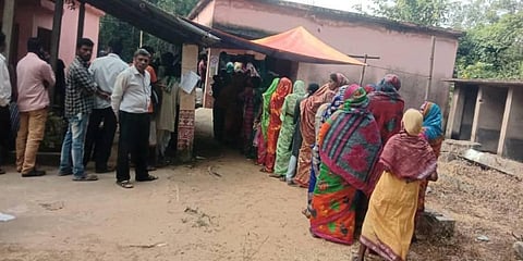 Voters line up on thursday morning for by-election to the Dhamnagar assembly constituency in Odisha. (Photo | Express)