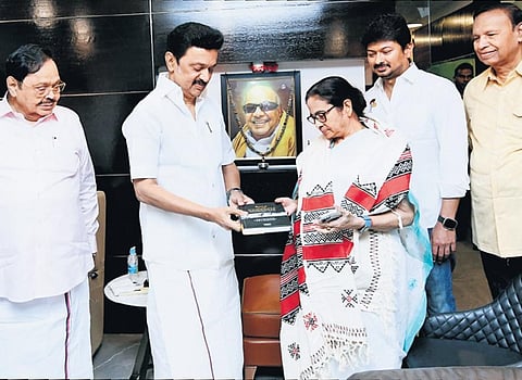 Chief Minister MK Stalin presented his West Bengal counterpart Mamata Banerjee a book, and she gave him a jar of rasgullas, in Chennai on Wednesday | Express