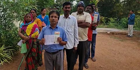 Voters lining up to cast their votes at the Munugode bye-election.(Photo | Express)