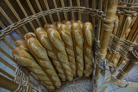 Baguettes in a basket are pictured at a bakery, in Versailles, west of Paris, Tuesday, Nov. 29, 2022. (Photo | AP)