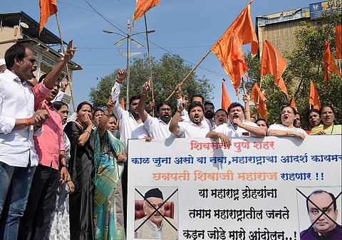 Shiv Sena workers protest against Maharashtra Governor Bhagat Singh Koshyari over his remarks against Chhatrapati Shivaji Maharaj, in Pune. (Photo | PTI)
