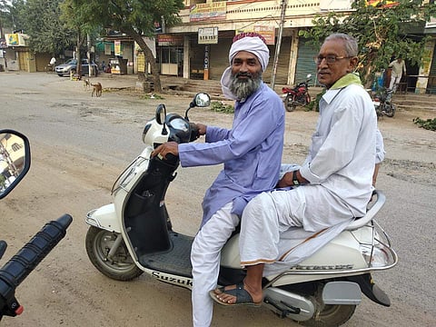 (Backdated Image used for representational purpose.) In a display of communal harmony on the day of Ayodhya verdict, a Muslim man drops of Hindu man at collectorate road in Karimnagar. (Photo | EPS)