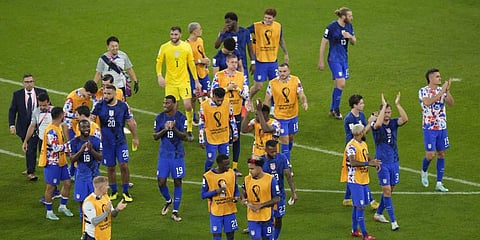U.S. players react at the end of the World Cup group B soccer match between Iran and the United States at the Al Thumama Stadium.(Photo | AP)