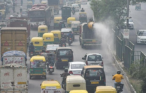  An anti-smog gun is used to spray water to curb air pollution, in New Delhi, on November 4, 2022. (Photo | PTI)