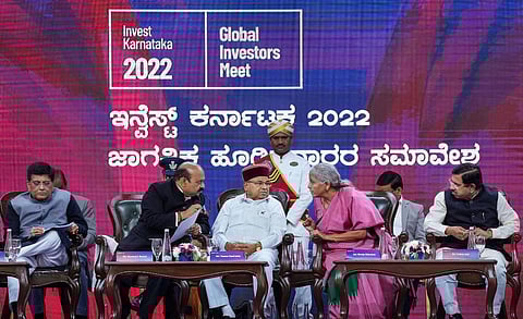 Finance Minister Nirmala Sitharaman, Commerce Minister Piyush Goyal, Karnataka CM Basavaraj Bommaia, and other ministers at the Global Investors Meet. (Photo | PTI)