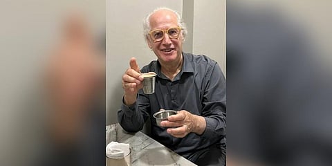 Zev Siegl, co-founder of Starbucks sipping on filter coffee at Vidyarthi Bhavan, Bengaluru. (Photo | Vidyarthi Bhavan Instagram)