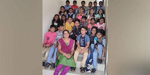 Lincy George with children of Govt Tribal HSS