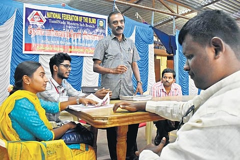 Instructor Ganesh Subramaniyan interacts with the visually-impaired students at the National Federation of the Blind in Coimbatore | S Senbagapandiyan