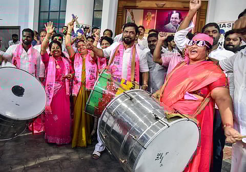 TRS/Bharat Rashtra Samithi (BRS) supporters celebrate Munugode Assembly constituency by-election results, at TRS Bhavan in Hyderabad, Sunday, Nov. 6, 2022. (Photo | PTI)