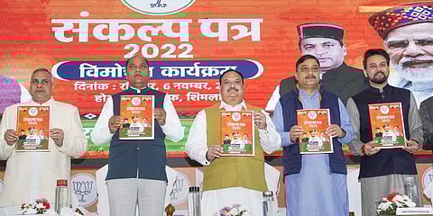 BJP National President JP Nadda along with Anurag Thakur, Himachal Pradesh CM Jai Ram Thakur and others releases BJP's manifesto for the upcoming Himachal Pradesh Assembly elections. (Photo | PTI)