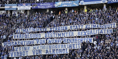Hertha's supporters hold protest banner during the match against Bayern Munich in Berlin, Germany, Nov. 5, 2022 against the Soccer World Cup in Qatar.(Photo | AP)
