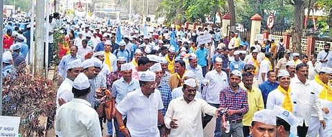 Government employees at the ‘OPS Sankalp Yatra’ in Belagavi on Sunday