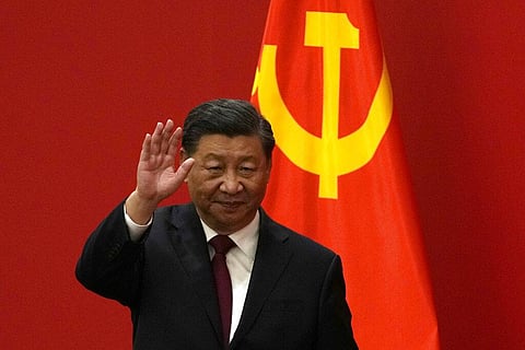 Chinese President Xi Jinping waves at the event to introduce new members of the Politburo Standing Committee in Beijing, Oct. 23, 2022. (File Photo | AP)