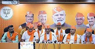 Senior Congress MLA Bhagwan Barad (centre) at BJP office in Ahmedabad. (Photo | BJP4India Twitter)