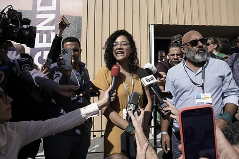 Sanaa Seif, sister of Alaa Abdel-Fattah, who is on a hunger and water strike, speaks to members of the media at the COP27 U.N. Climate Summit,  Nov. 8, 2022,  in Sharm el-Sheikh, Egypt. (Photo | AP)