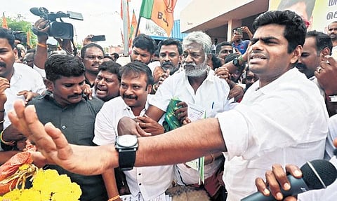 BJP state president K Annamalai interacts with traders while inspecting the Mattuthavani vegetable market in Madurai on Tuesday | kk sundar