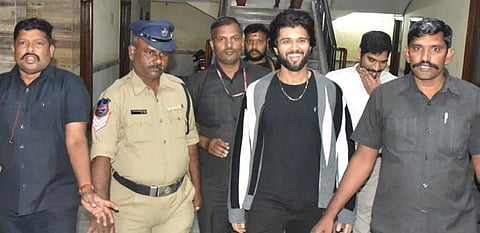 Tollywood actor Vijay Deverakonda smiles as he leaves the Enforcement Directorate office in Hyderabad on Wednesday. (Photo | EPS)