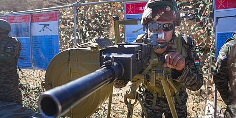 An Indian Army soldier at a weapon exhibition during India-US joint exercise 'Yudh Abhyas', at Auli in Uttarakhand. (Photo | PTI)