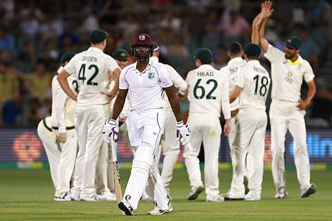 West Indies' Shamarh Brooks walks off after losing his wicket to Australia's Scott Boland on the third day of their cricket test match in Adelaide, Nov. 10, 2022. (Photo | AP)